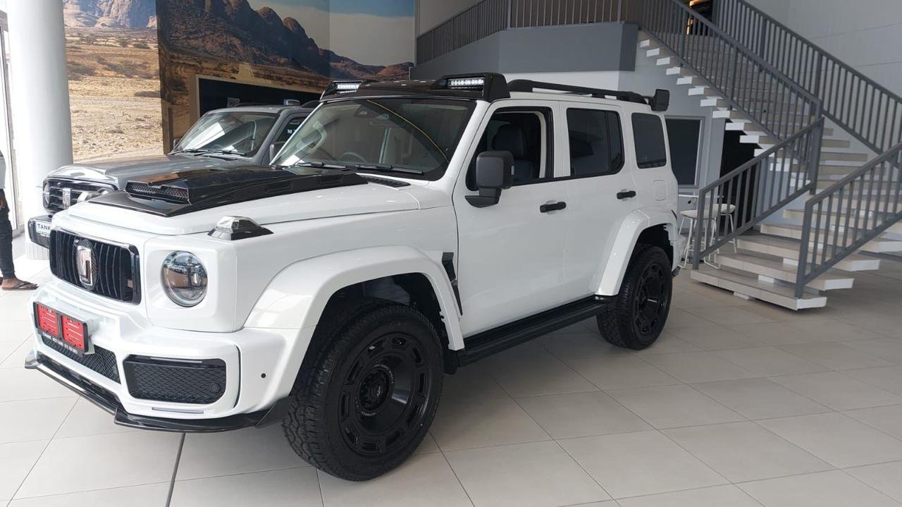 White GWM Tank 300 front three-quarter view in a showroom