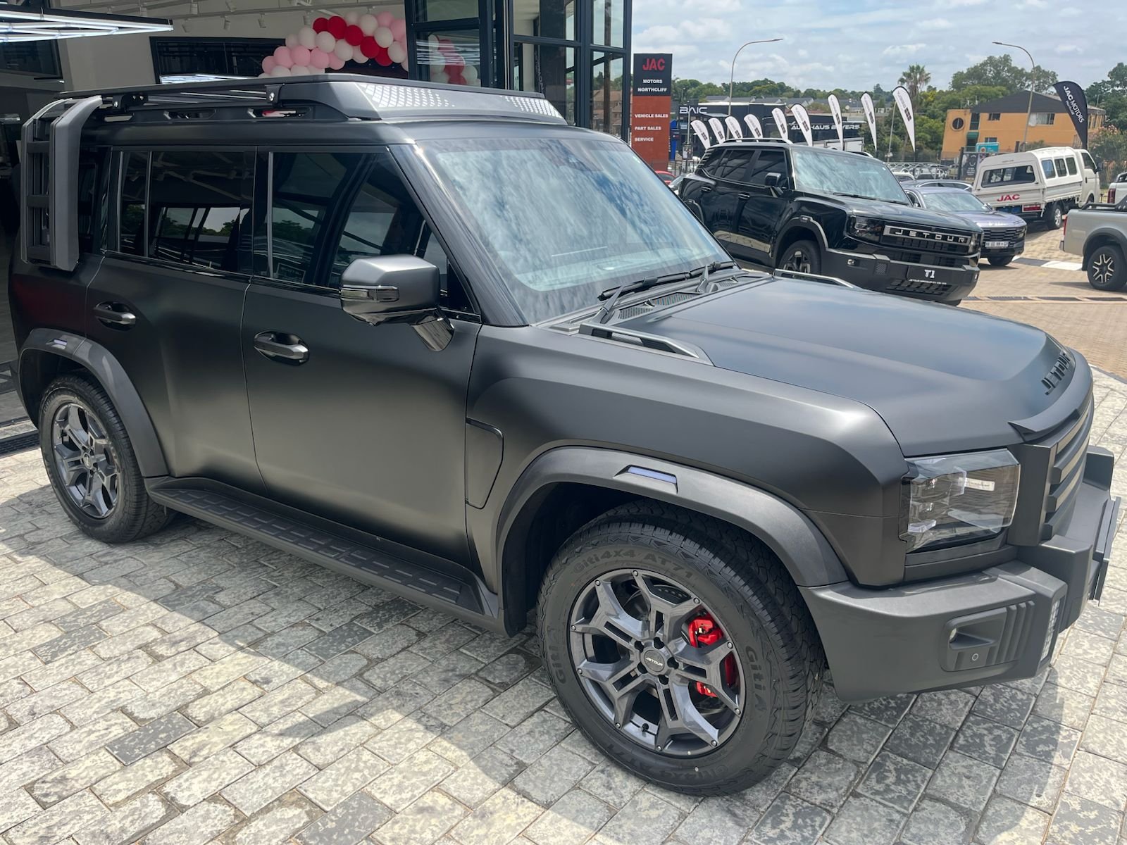 Dark grey Jetour T2 front side view