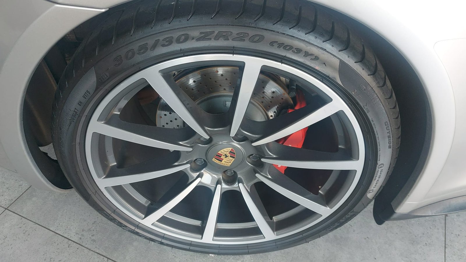 Porsche 911 Carrera 4S alloy wheel and red brake caliper