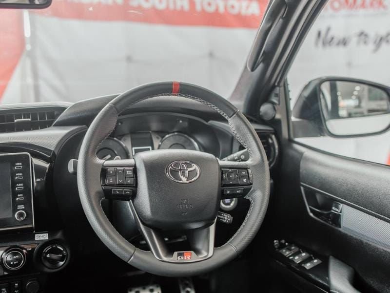 Toyota Hilux GR-S steering wheel and dashboard