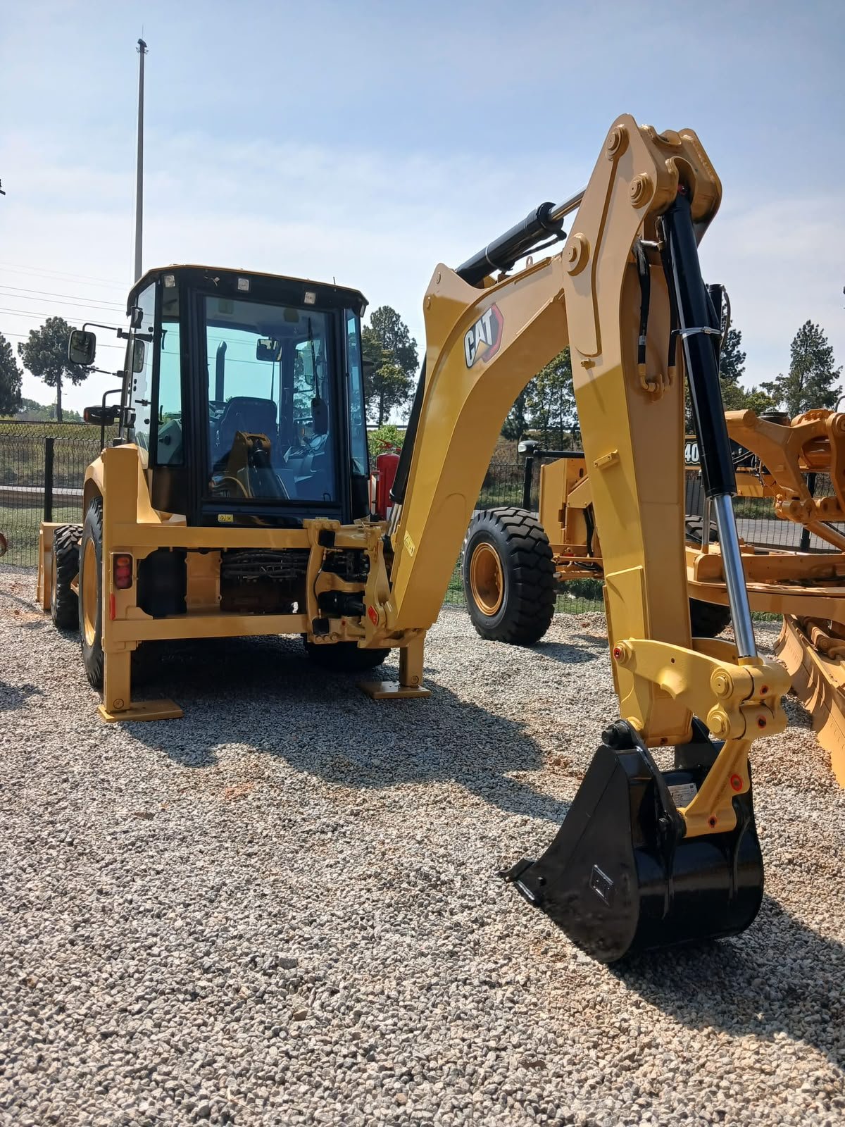 Cat 426F2 backhoe loader rear excavator arm